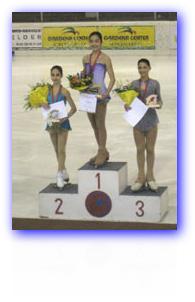 GOLD MEDALIST NINA JIANG stands on podium with Silver and Bronze medalists after Novice event in Italy